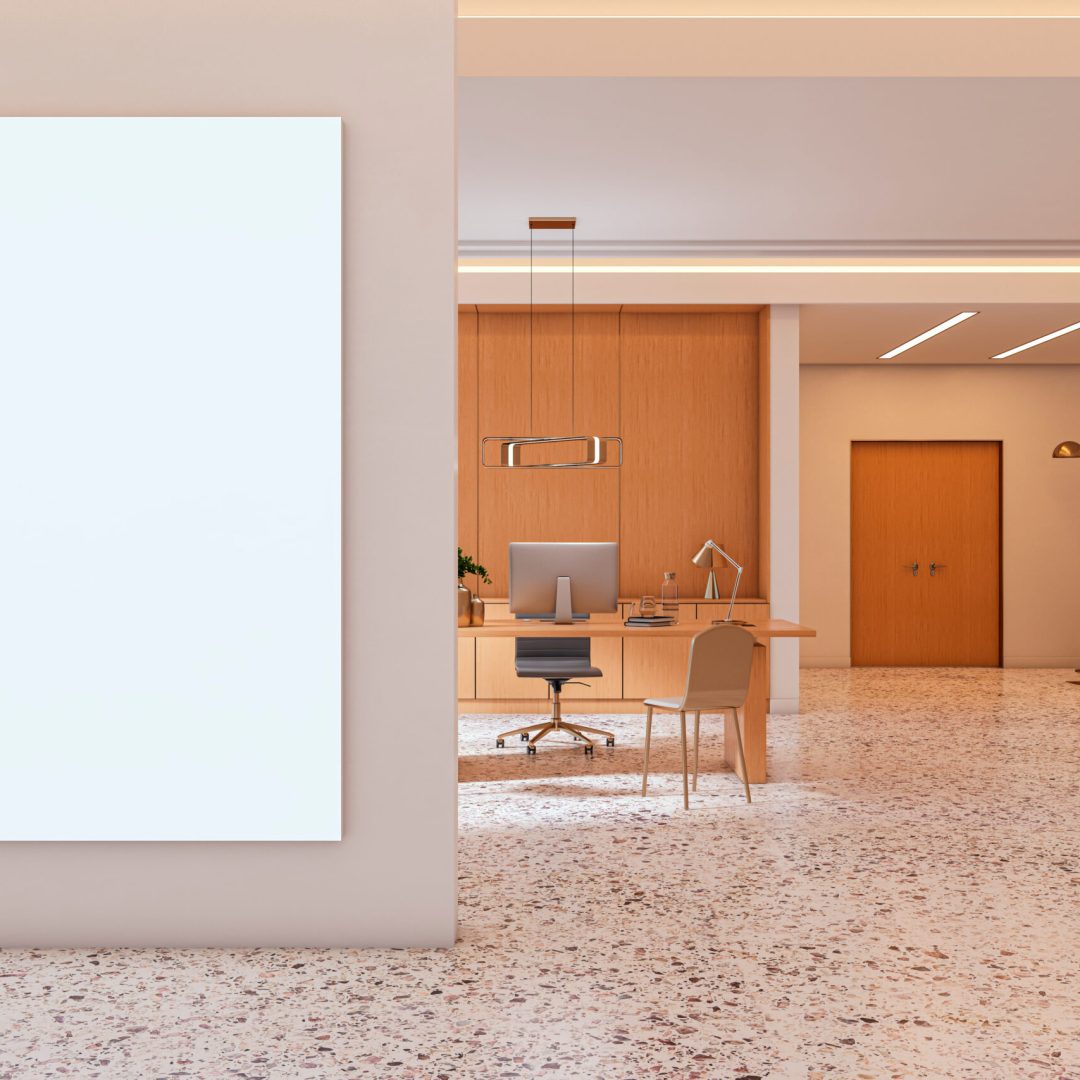 Vertical poster mockup on wall in modern office with terrazzo flooring, wood decor, stylish furniture, and warm lighting. 3D Rendering